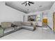 Comfortable living area showing neutral decor, open floorplan, and tile floors at 491 Majestic Gardens Blvd, Winter Haven, FL 33880