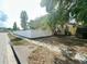 View of a quaint home featuring a white picket fence bordering the well-maintained front yard at 5030 Silver Thistle Ln, St Cloud, FL 34772