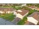 Well-maintained home with a paved driveway, and a two-car garage, in a desirable neighborhood at 5253 Pebble Beach Blvd, Winter Haven, FL 33884