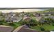 A Primary planned community with single Gathering homes and stunning lake views at sunset at 5253 Pebble Beach Blvd, Winter Haven, FL 33884