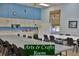 Large Arts & Crafts room featuring lots of table space, a sink, and ample storage at 5253 Pebble Beach Blvd, Winter Haven, FL 33884