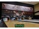 Community bowling alley with multiple lanes, scoring systems, and eye-catching decor at 5253 Pebble Beach Blvd, Winter Haven, FL 33884