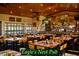 The Eagle's Nest Pub offers tables, chairs, a full bar, and big windows with views of the greenery at 5253 Pebble Beach Blvd, Winter Haven, FL 33884