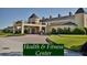 Beautiful view of the Health & Fitness Center with covered entrance and lush landscaping at 5253 Pebble Beach Blvd, Winter Haven, FL 33884