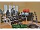 Well-equipped weight room with modern machines, free weights, mirrors and other fitness equipment at 5253 Pebble Beach Blvd, Winter Haven, FL 33884