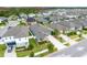 Beautiful aerial view of a well-planned community featuring modern homes and lush landscaping near a lake at 5876 Bar Ranch Rd, St Cloud, FL 34771