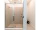 Shower room featuring glass doors and tiled walls, with both a shower head and wand at 5876 Bar Ranch Rd, St Cloud, FL 34771
