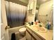 Bathroom featuring a vanity, toilet, and shower/tub combination at 622 Dromedary Ct, Kissimmee, FL 34759