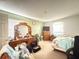 Bedroom with bed, dresser, and natural light coming through the window at 622 Dromedary Ct, Kissimmee, FL 34759