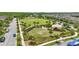 Beautiful community park with playground, green space, and charming pergola perfect for outdoor recreation at 8378 Randal Park Blvd, Orlando, FL 32832