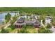 Beautiful community with pool, clubhouse, lake, manicured lawns, and lush trees at 8378 Randal Park Blvd, Orlando, FL 32832