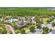 Beautiful community with pool, clubhouse, lake, manicured lawns, and lush trees at 8378 Randal Park Blvd, Orlando, FL 32832