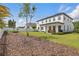 Spacious backyard featuring a lush green lawn and privacy fence at 8378 Randal Park Blvd, Orlando, FL 32832