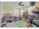 Bright, inviting bedroom perfect for play or sleep at 8378 Randal Park Blvd, Orlando, FL 32832