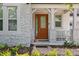 Charming front porch with stone accents and an inviting entrance at 8378 Randal Park Blvd, Orlando, FL 32832