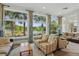 Lounge area with furniture and large windows showing outside view at 8378 Randal Park Blvd, Orlando, FL 32832