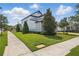 Well-maintained lawn and garden surrounding the property at 8378 Randal Park Blvd, Orlando, FL 32832