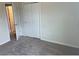 Cozy bedroom with carpeted flooring and closet space at 1148 Sugarwood St, Davenport, FL 33837