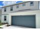 Charming two-story home with a two-car garage and well-maintained landscaping at 1148 Sugarwood St, Davenport, FL 33837