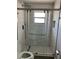 Well-lit bathroom featuring glass shower stall at 1256 S Bumby Ave, Orlando, FL 32806
