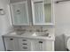 Contemporary bathroom with double sinks, vanity and framed mirror at 1256 S Bumby Ave, Orlando, FL 32806