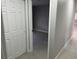 Neutral bedroom showcasing the door and a peek of the room through the doorway at 1256 S Bumby Ave, Orlando, FL 32806