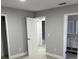 Neutral bedroom featuring a connecting door to the ensuite bathroom at 1256 S Bumby Ave, Orlando, FL 32806