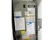 Close-up of a well-maintained HVAC system with visible documentation and components at 1256 S Bumby Ave, Orlando, FL 32806