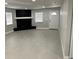 Bright living room with fireplace, tile floors, neutral colors and lots of natural light at 1256 S Bumby Ave, Orlando, FL 32806
