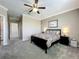 Spacious bedroom featuring an ensuite bath and a doorway to the adjacent room at 1373 Williams Rd, Winter Garden, FL 34787