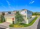 Charming two-story home featuring colorful siding and a fenced in front yard at 1373 Williams Rd, Winter Garden, FL 34787