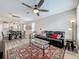 Bright living room with a ceiling fan, hardwood floors and ample space for entertaining at 1373 Williams Rd, Winter Garden, FL 34787