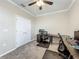 Bright home office with a ceiling fan, neutral walls, and dedicated workspaces at 1373 Williams Rd, Winter Garden, FL 34787