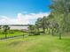 Waterfront park with grassy lawns, walking paths, and a lakeside gazebo at 1373 Williams Rd, Winter Garden, FL 34787