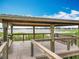 Waterfront park gazebo at the end of a path overlooking a tranquil lake at 1373 Williams Rd, Winter Garden, FL 34787