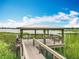 Waterfront park pavilion with a bench and scenic lake views at 1373 Williams Rd, Winter Garden, FL 34787