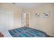 Bright bedroom with large closet and views into the hallway at 1688 Tamarind Rd, Davenport, FL 33896