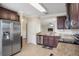 Modern kitchen with stainless steel appliances and granite countertops at 1688 Tamarind Rd, Davenport, FL 33896