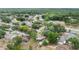 Residential neighborhood featuring diverse homes, mature trees, and green spaces creating a serene suburban setting at 17 Juniper Dr, Davenport, FL 33837