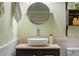 Bathroom features a modern vessel sink with vanity at 17 Juniper Dr, Davenport, FL 33837