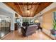 Bright living room with wood ceiling, recliner and sofa at 17 Juniper Dr, Davenport, FL 33837
