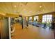 Fitness center equipped with treadmills, elliptical machines, weights, and mirrors for a complete workout at 2147 Tripoli Ct, Kissimmee, FL 34747
