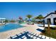 Gorgeous community pool area, featuring water park play area and a poolside bar and lounge area at 2147 Tripoli Ct, Kissimmee, FL 34747