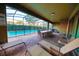Inviting screened-in pool area with ample seating and lounge chairs for ultimate relaxation and outdoor dining at 2147 Tripoli Ct, Kissimmee, FL 34747
