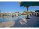 Spacious community pool featuring ' water park, shady pergola and poolside lounge, with bar and lounge at 2147 Tripoli Ct, Kissimmee, FL 34747