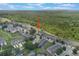 Expansive aerial view of townhomes backing up to natural wooded area in a lush community setting at 2322 Silver Palm Dr, Kissimmee, FL 34747