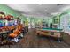 Community game room featuring arcade games, pool table, movie theater door, and fun activities for residents' enjoyment at 2322 Silver Palm Dr, Kissimmee, FL 34747