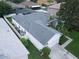 Aerial view of a well-maintained single-Gathering home with a gray roof at 2341 Stone Cross Cir, Orlando, FL 32828