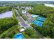 Aerial view of community amenities including a pool, tennis courts, and playground at 2341 Stone Cross Cir, Orlando, FL 32828