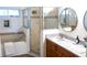 Bright bathroom with shower, soaking tub and vanity with double sinks at 2341 Stone Cross Cir, Orlando, FL 32828